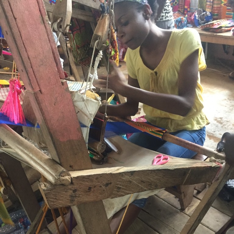 HIEP recipients in Africa - Sara Fortune weaving on a loom in Ghana