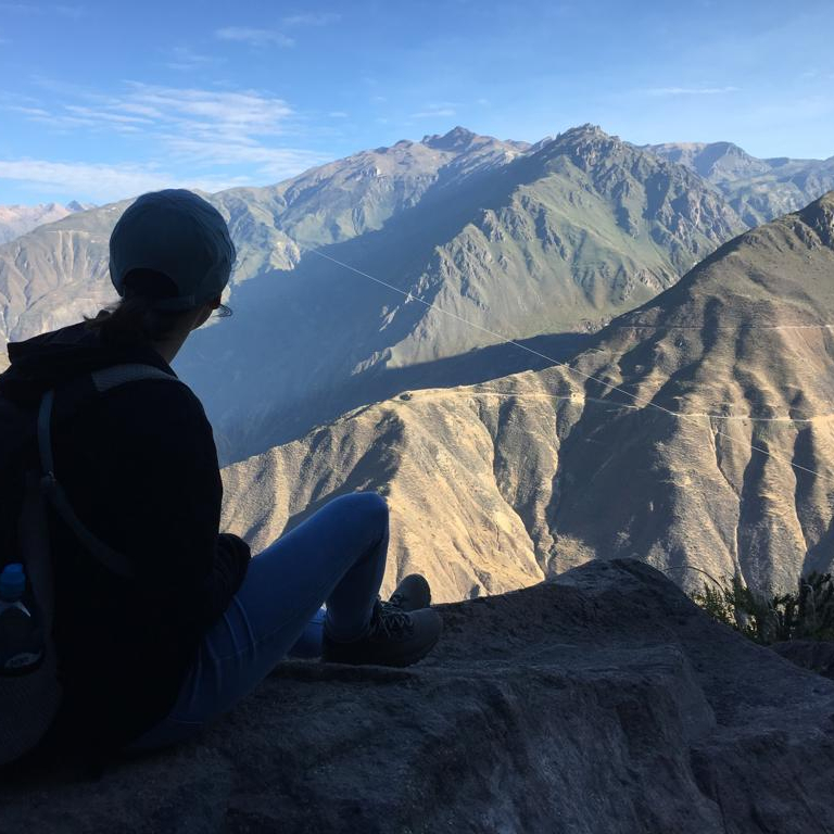 HIEP recipients in South America - Sunny Aldrich sits on a mountain overlooking Peru