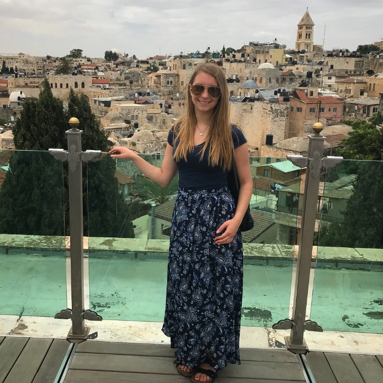 HIEP recipients in Asia and the Middle East - Julia Spector poses for a photo overlooking a city in Israel.