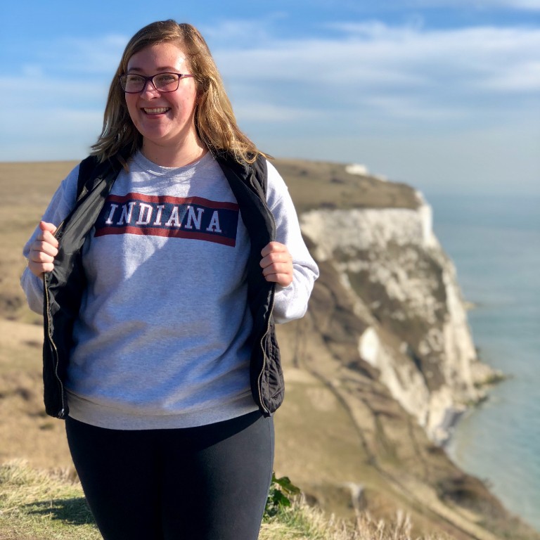 HIEP students in the UK - Kendall Powell poses in an INDIANA t-shirt overlooking the cliffs of Dover in England.